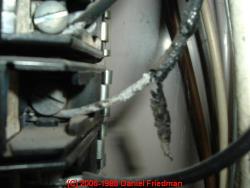 Photograph of overheating aluminum-wired electrical outlet