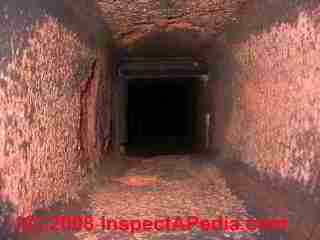 Spalling damaged chimney flue interior (C) Daniel Friedman