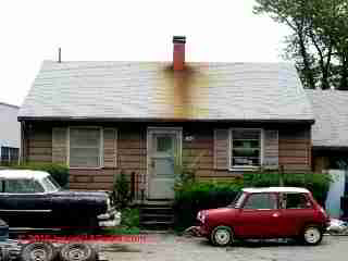 Brown rust and creosote stains on a roof (C) Daniel Friedman