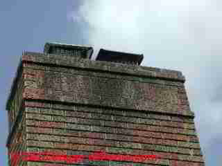 Dark stains on masonry chimney trarced to algae (C) Daniel Friedman