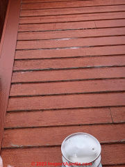 condensation from direct vent furnace exhaust is ruining paint on siding (C) InspectApedia.com MarkB