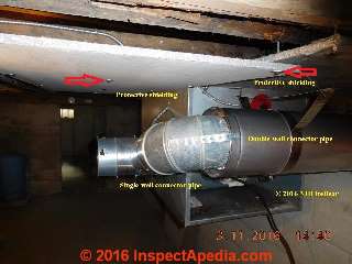 Heat shielding installed over a single thickness metal flue vent connector (C) InspectApedia NH FireBear