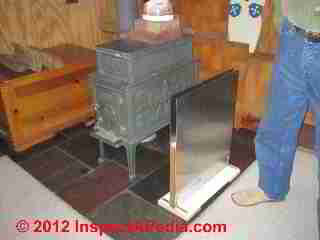 Jotl wood stove installation (C) Daniel Friedman Paul Galow