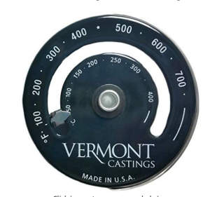 Modern Vermont Castings woodstove flue thermometer reading up to 700 deg F at InspectApedia.com