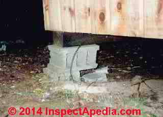 Loose concrete block as a poor substitute for a masonry pier below a wood-framed structure (C) Daniel Friedman