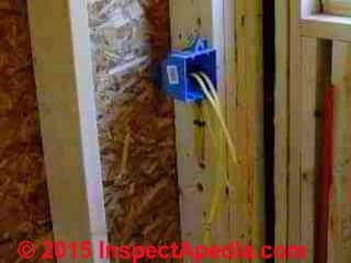 Plastic electrical box nailed to wall stud in new construction (C) Daniel Friedman