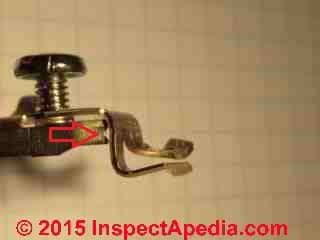 Back wired receptacle spring clip close up details (C) Daniel Friedman