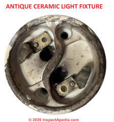 Antique ceramic light or lamp connector, two prong, possibly Brush-Swan (C) InspectApedia.com anon
