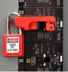 Circuit breaker lock installed on a Square-D circuit breaker - using padlock and key to open - at InspectApedia.com