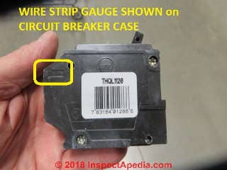 Circuit breaker wire strip gauge shown on molded case (C) Daniel Friedman at InspectApedia.com