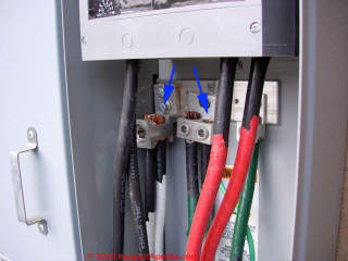 Double lugging at the electrical panel main lugs (C) InspectApedia.com reader (inspector) 