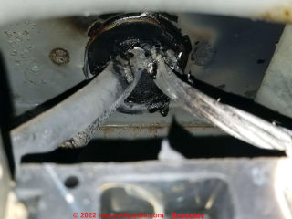 Electric meter wiring overheats, shorts, burns, damages Zinsco panel - (C) InspectApedia.com Bressler