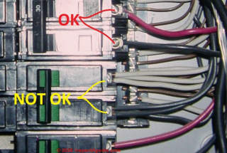Overloaded screw terminals at a circuit breaker that is triple-tapped (C) Daniel Friedman at InspectApedia.com