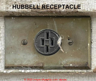 Hubbell electrical receptacle providing both parallel and tandem wall plug blade slots to accept either wall plug type (C) InspectApedia.com Hearn