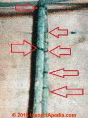 Knob tube wiring hung over an electrical conductor (C) Daniel Friedman
