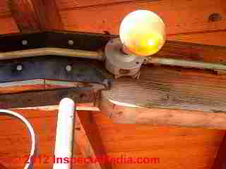 Unsafe outdoor lighting © D Friedman at InspectApedia.com 