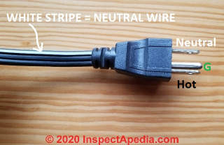 White strip on line cord indicates the neutral wire (C) Daniel Friedman at InspectApedia.com