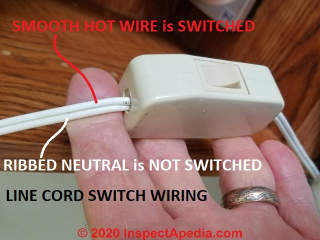 Line cord switch wiring detail: which wire is connected to the switch ? (C) Daniel Friedman at InspectApedia.com - answer: the ribbed-insulation identifies the un-switched neutral wire. Switch the hot wire. 