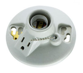 Porcelain lamphplder with electrical outlet - by GE - cited and Discussed at InspectApedia.com