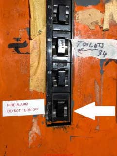 Pushmatic electrical panel showing fire alarm breaker (C) InspectApedia.com FAB