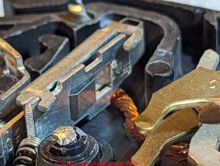 Photos of probably minor blacking burning of contact surfaces in a QO circuit breaker (C) InspectApedia.com Riccio