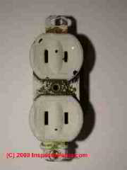 Un-grounded electrical receptacle (C) Daniel Friedman