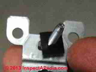 Receptacle mounting screw retainer clip (C) Daniel Friedman  2013