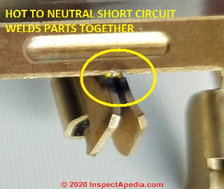 Shorted wall plug adapter (C) Daniel Friedman at InspectApedia.com