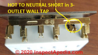 Shorted wall plug adapter (C) Daniel Friedman at InspectApedia.com