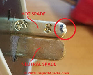 Burned hot spade connector on a multi-plug connector (C) Daniel Friedman at InspectApedia.com