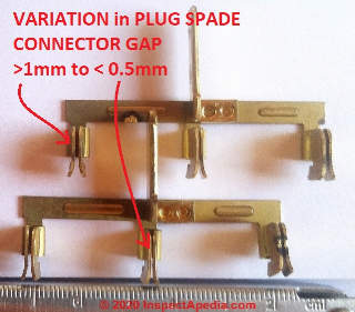 Variation in wall plug spade connector opening width or "gap" in the 3 plug wall adapter (C) Daniel Friedman at InspectApedia.com