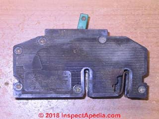 Zinsco circuit breaker with case blown out and burned bus bar contacts (C) InspectApedia.com