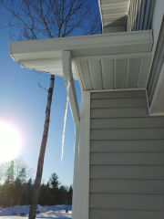 Icicle hanging from gutter in norther MN home (C) Inspectapedia AJC