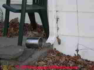 Damaged aluminum siding (C) Daniel Friedman