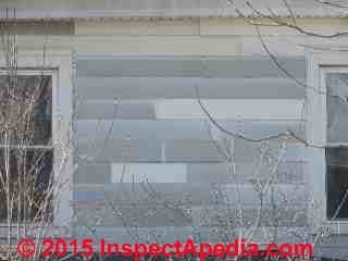 Damaged aluminum siding (C) Daniel Friedman