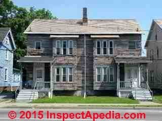 Worn asphalt siding on a Pougheepsie New York home  (C) Daniel Friedman 2015