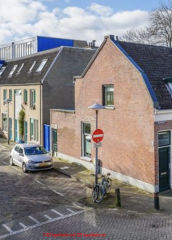 Various stains on brick of 100 year old building in the Netherlands (C) InspectApedia.com Arlath E 