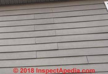 Certainteed FC siding with nailing defects and siding blowing or falling off (C) InspectApedia.comJF