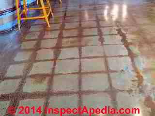 Stains in pattern on concrete slab floor © Daniel Friedman