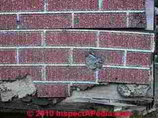 Damaged asphalt siding (C) Daniel Friedman