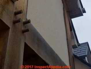 Weathering, graying, and perhaps some mold on exposed wood timbers (C) Inspectapedia.com