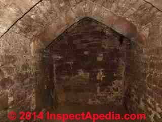 Stains on brick dungeon, Goodrich Castle, Ross on Wye, Herefordshire England (C) Daniel Friedman