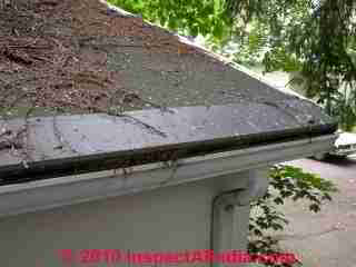 Gutter cap or helmet © D Friedman at InspectApedia.com 