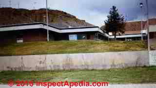 Retaining wall accident report - no guardrail at school play area (C) InspectApedia M-L_H