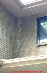 Brick stain from roof leak (C) InspectApedia.com James