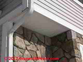 Stone veneer wall over wood frame - hidden leaks © D Friedman at InspectApedia.com 