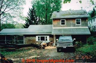 Removed tree that was shading roof and bringing carpenter ants into the structure (C) Daniel Friedman