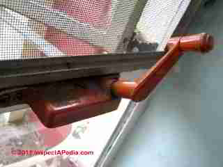 PHOTO of a window operator crank, Hong Kong (C) 2011 Daniel Friedman & W.H.L.