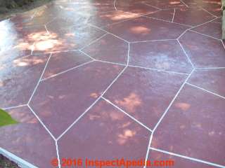 Completed colored, stamped concrete entry patio (C) InspectApedia.com