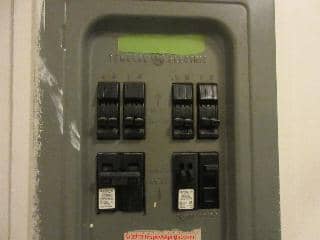 GE electrical panel as sub panel violates the 6-switch rule with no readily accessible main switch? (C) InspectApedia.com Vince